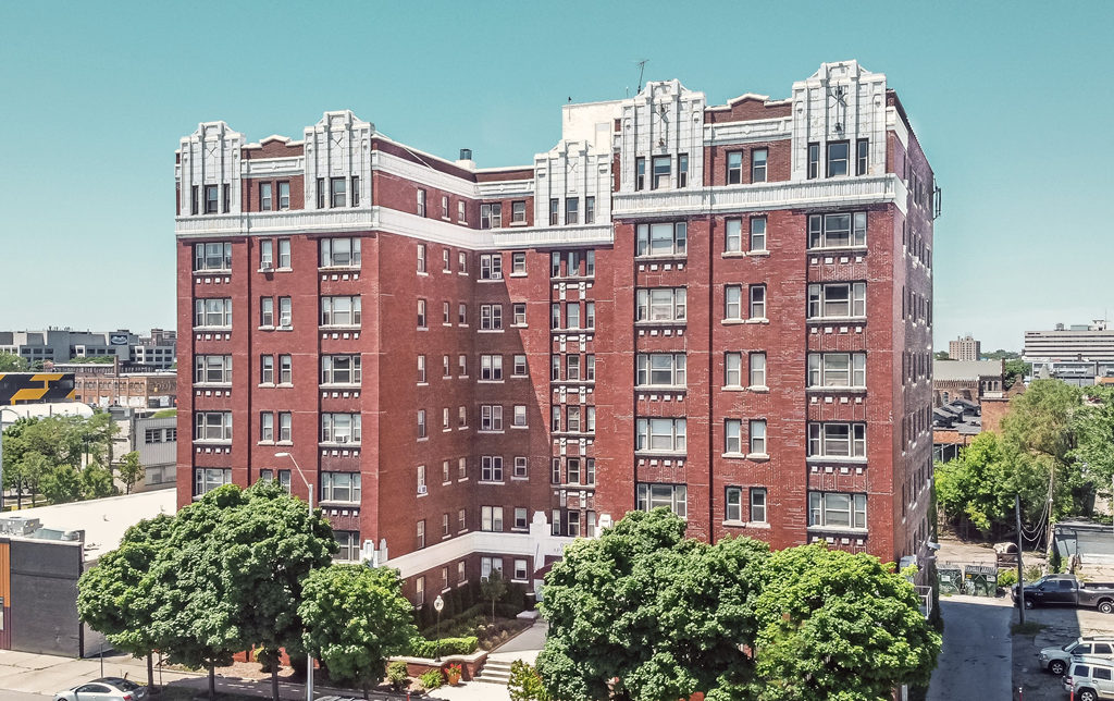 a red brick building with white trim