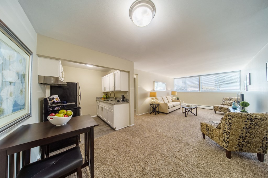 Kitchen and Living Area Open floor plan with kitchen, dinning area, and living room.