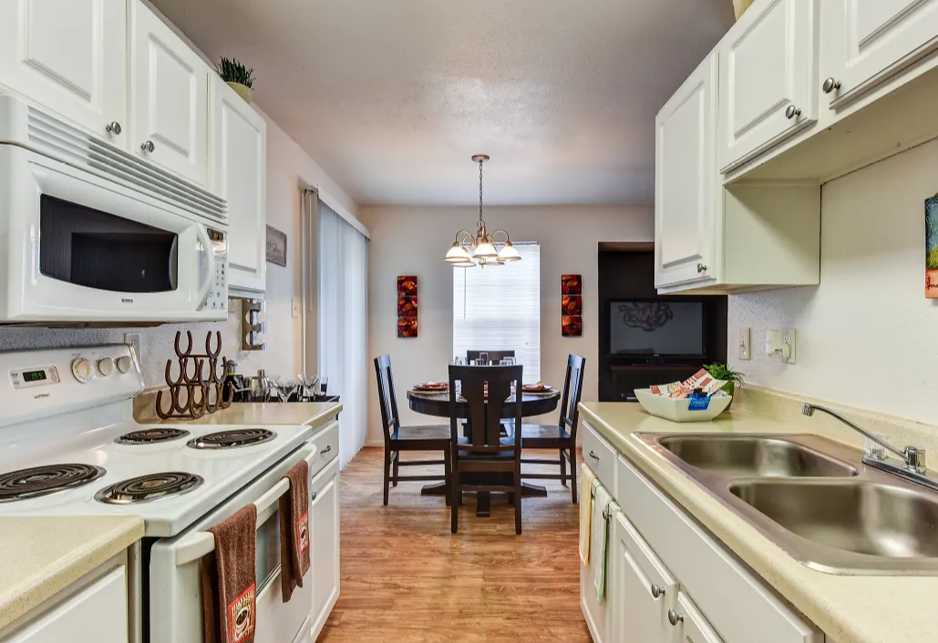 Galley kitchen facing dining area