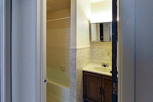 a bathroom with a sink and a bathtub