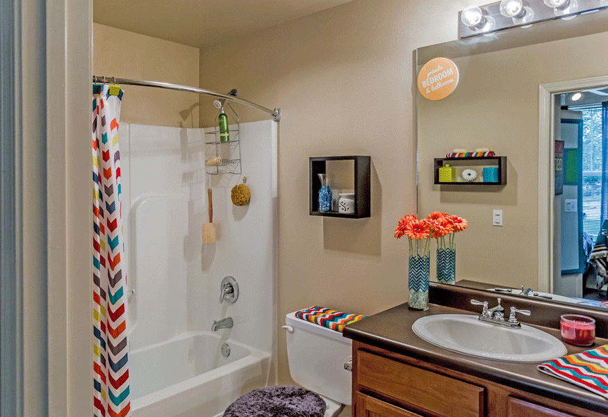 Bathroom with orange decor