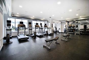 a room filled with lots of exercise equipment