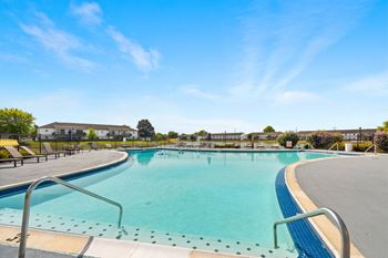 Two Resort-Style Swimming Pools with Sundeck & Complimentary Wi-Fi