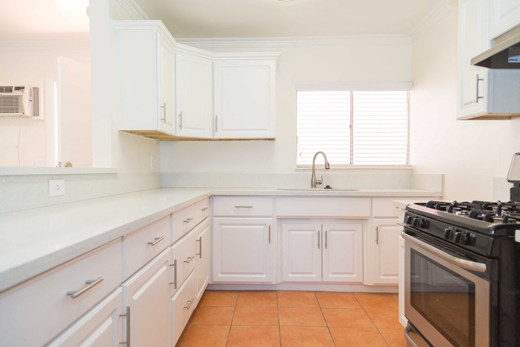 view of kitchen with sink and window in the middle