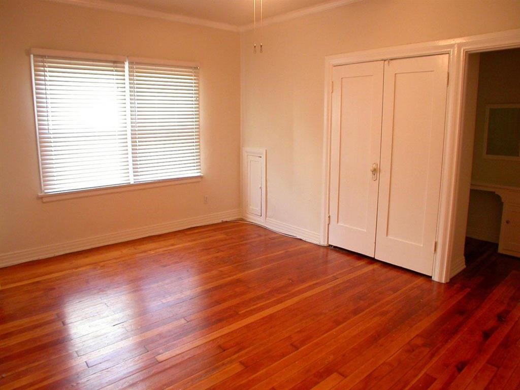 Bedroom with window and closet