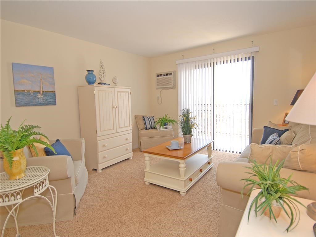 Living room with view of double doors