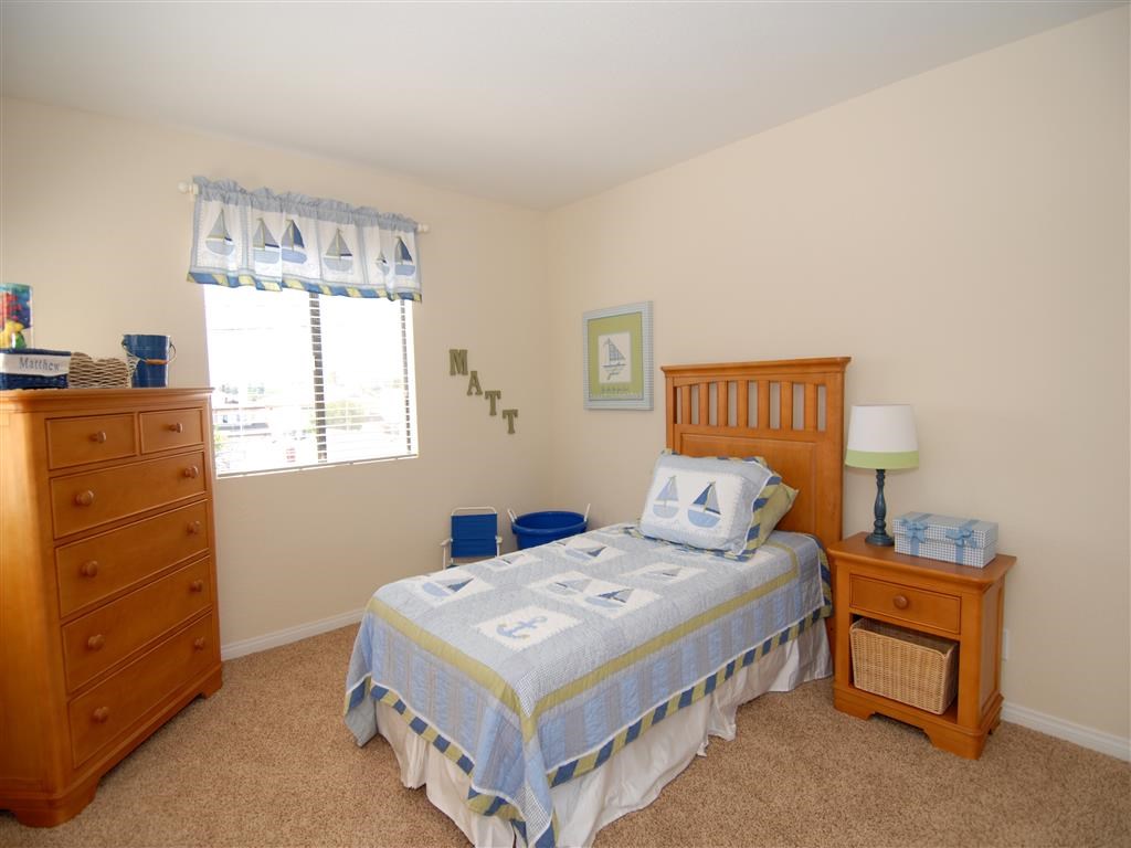 Bedroom with window and furniture
