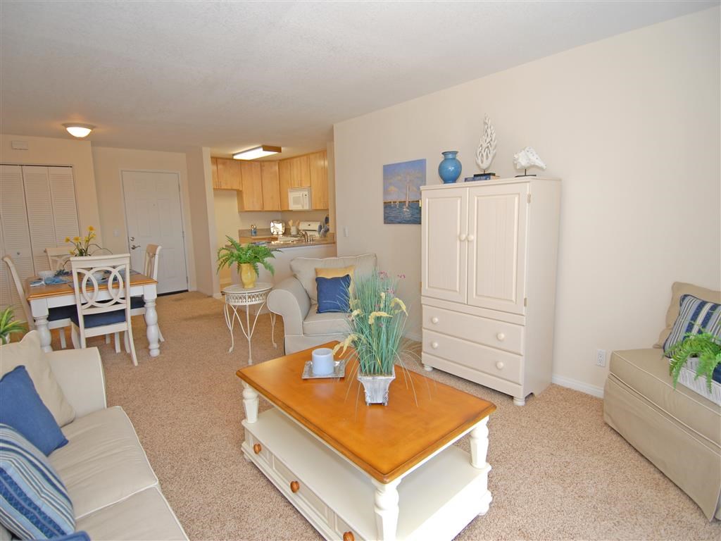 Living room with view of kitchen