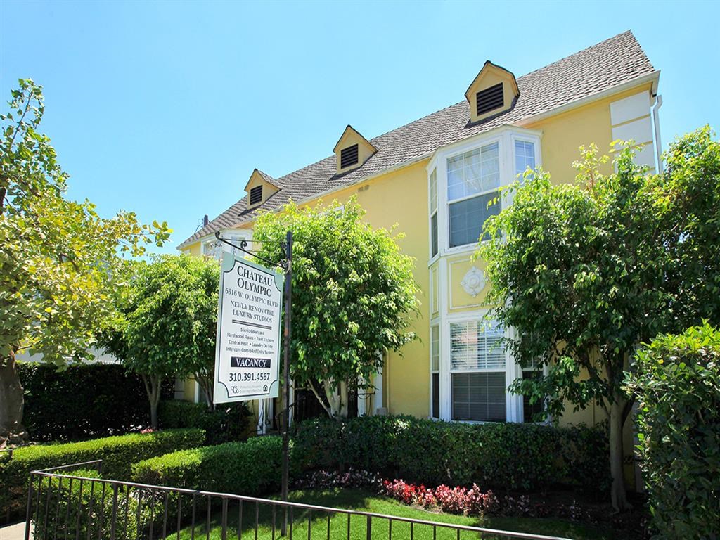 Front with the Leasing sign