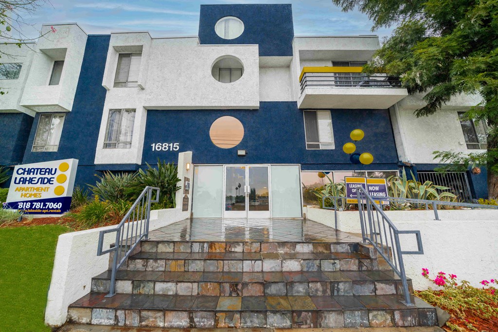 a view of the front of the building with steps