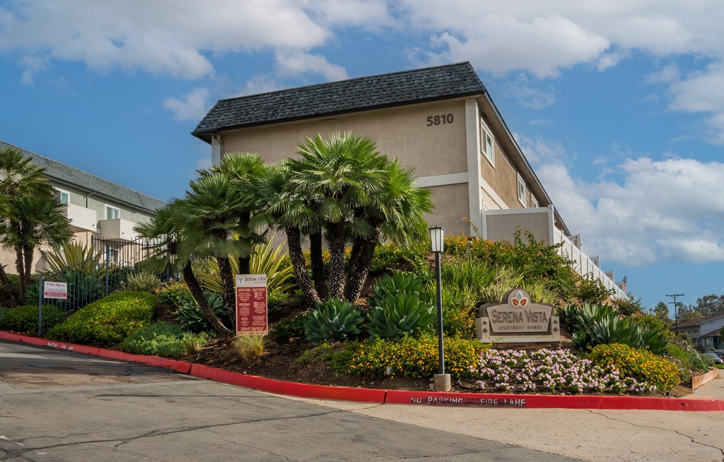 a building with a landscaped garden in front of it