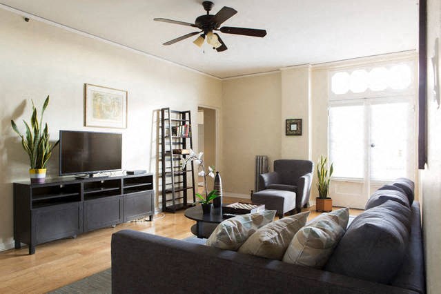 living room with ceiling fan