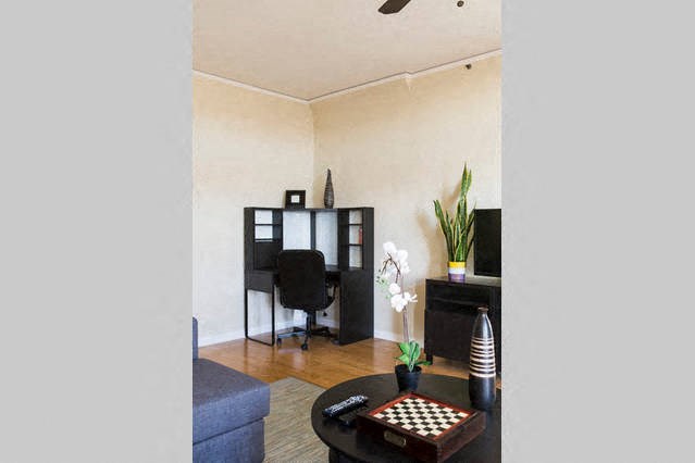 living room with offic ein corner