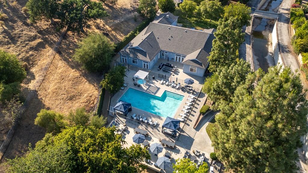A large house with a pool and a deck.