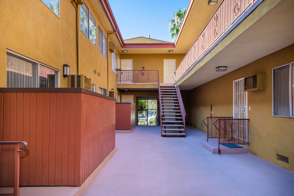 Courtyard with a staircase and a balcony