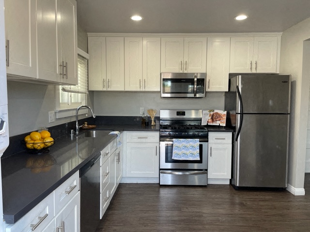 Renovated kitchen with upgraded stainless steel appliances