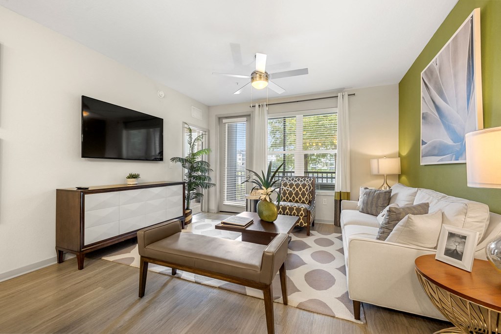 a living room with a couch and a coffee table at Pearce at Pavilion Luxury Apartments, Riverview, FL, Florida, 33578