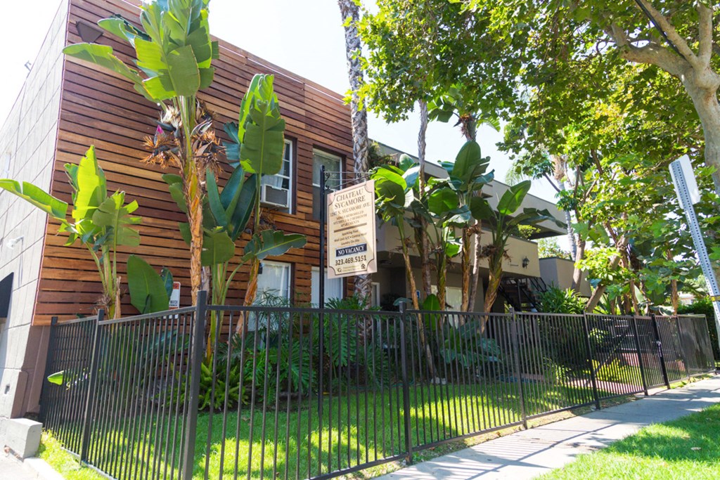 Entrance with gate and leasing sign
