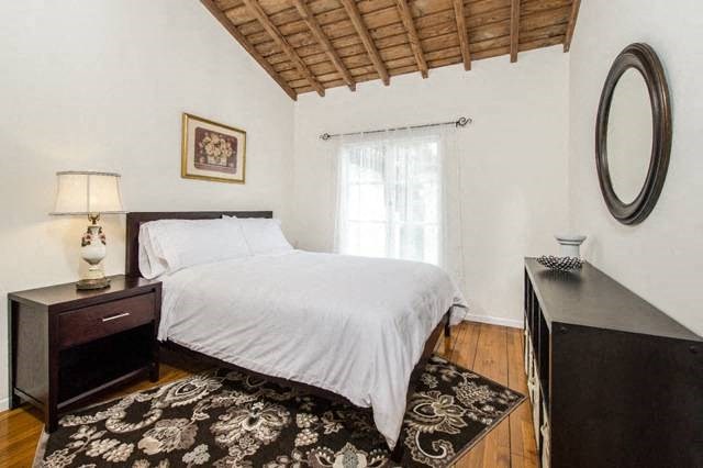 Villa Valentino 17 Second Bedroom with white queen bed