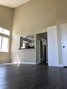 living room with view of kitchen entrance