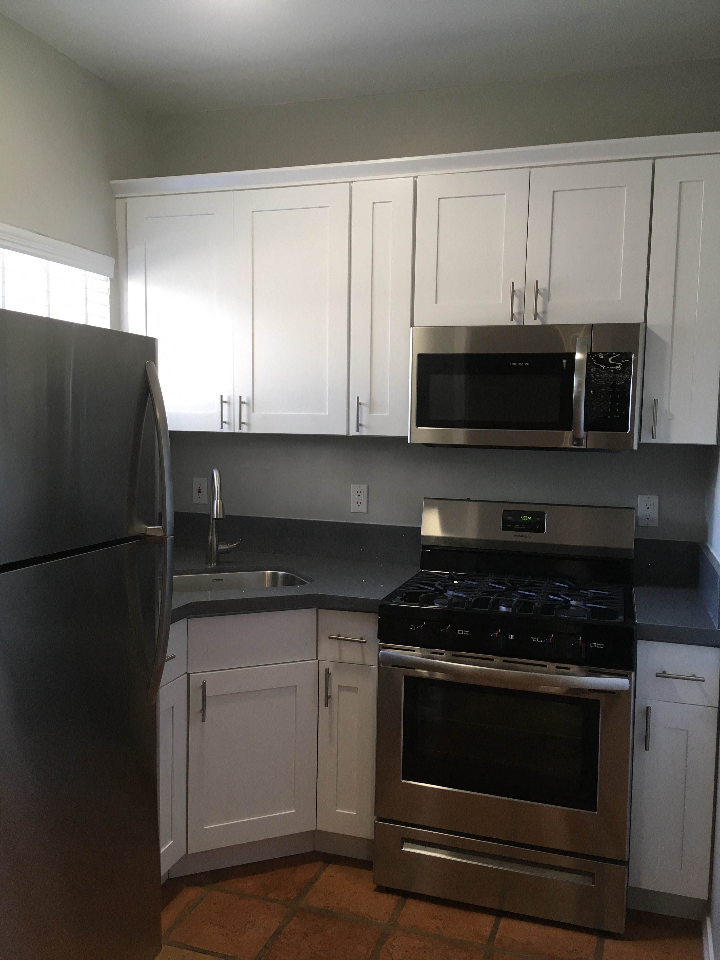 Kitchen stove, oven, and fridge