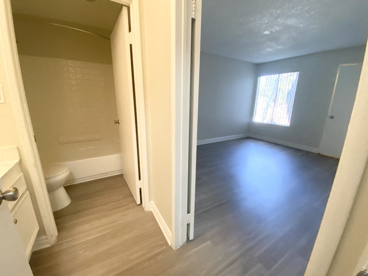 Bathroom and room with window