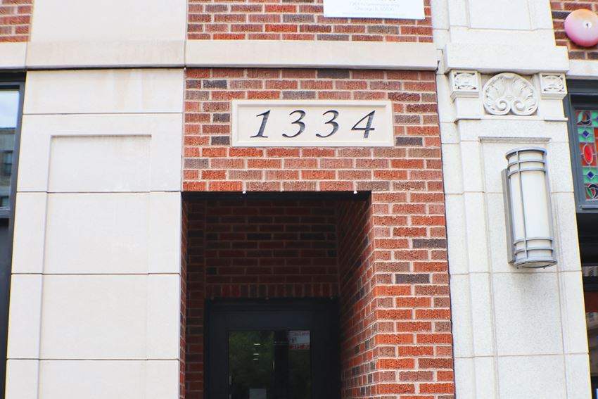 a brick building with the number 1334 on it - Photo Gallery
