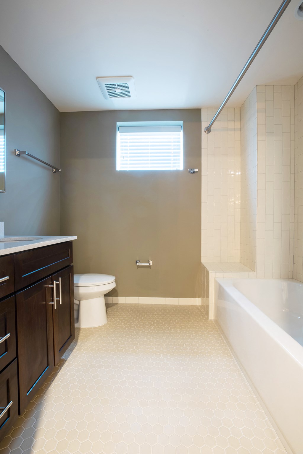 a bathroom with a toilet sink and bathtub