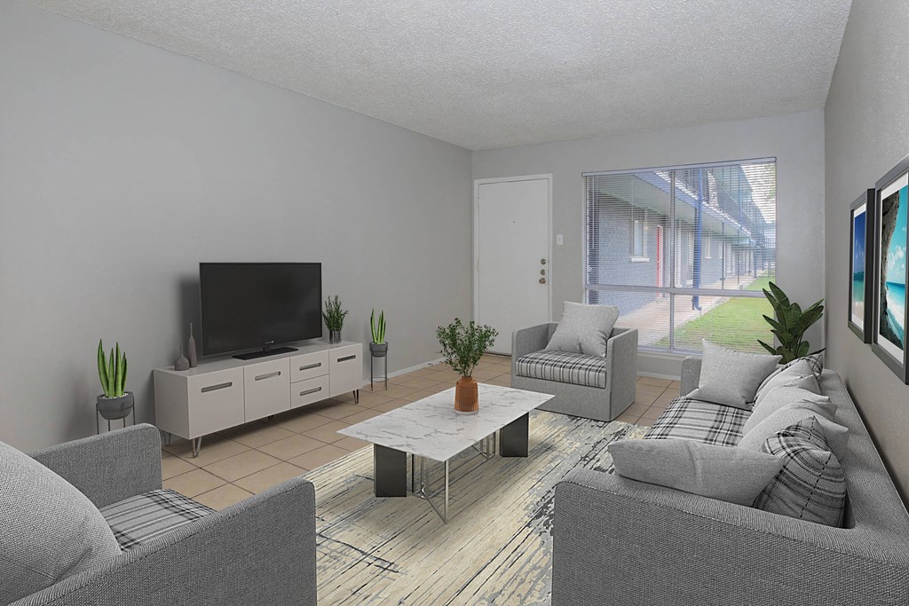 a living room with a couch and a tv