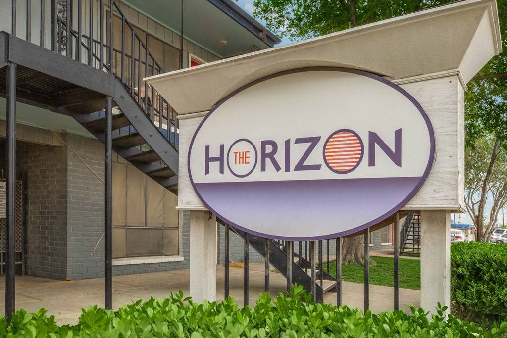 a sign for the rizon at the front of a building