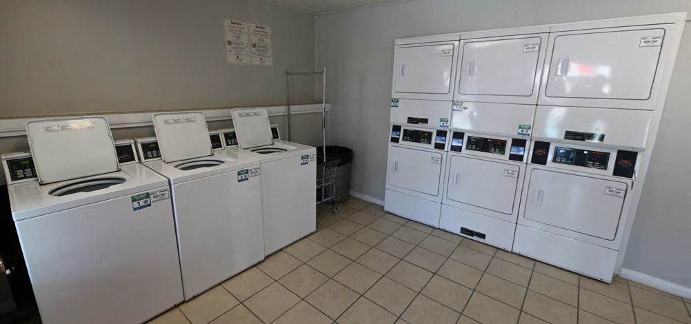 a group of white appliances in a room