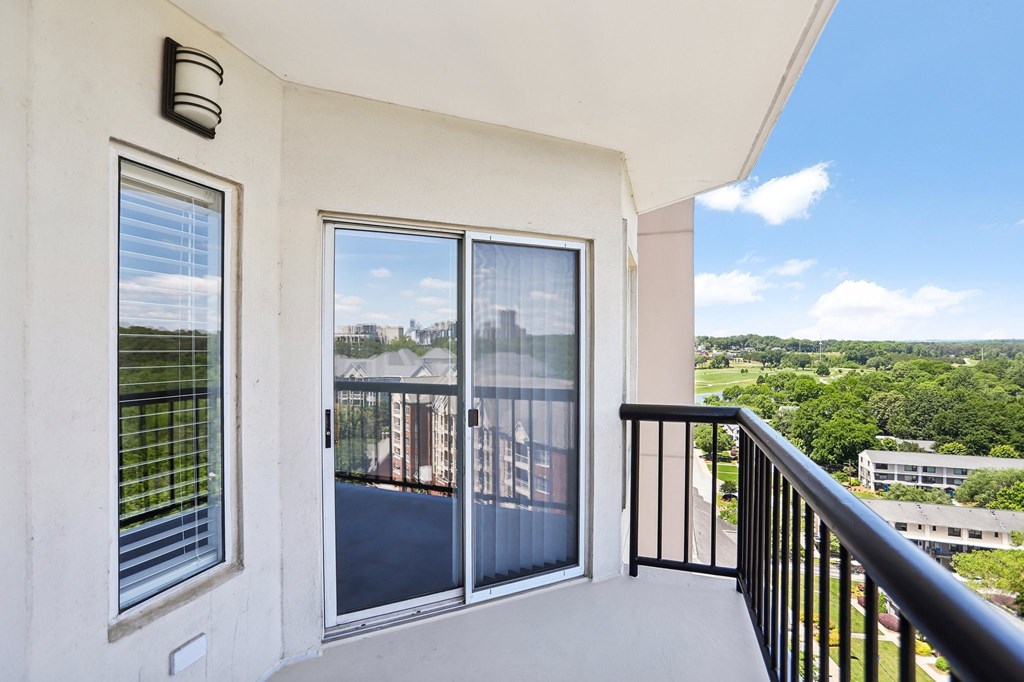 A balcony with a beautiful view.