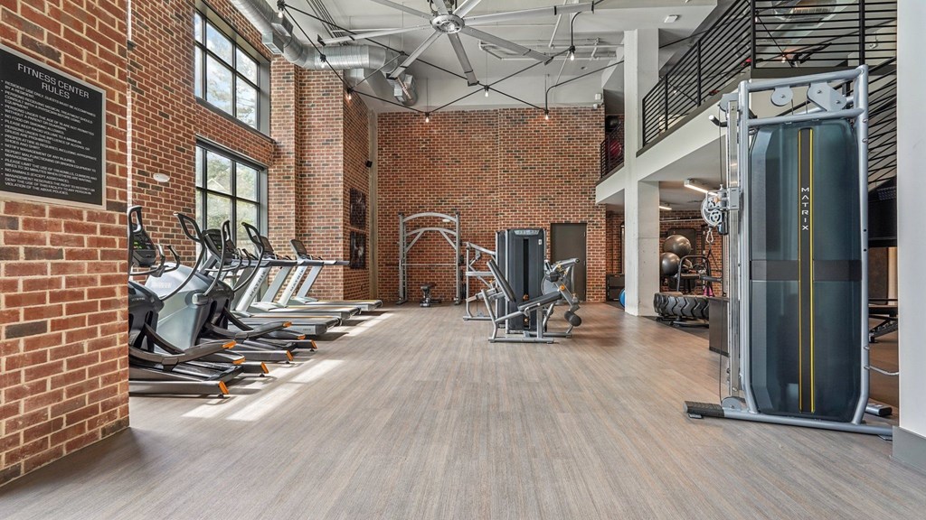 A gym with cardio and resistance machines with many other equipment