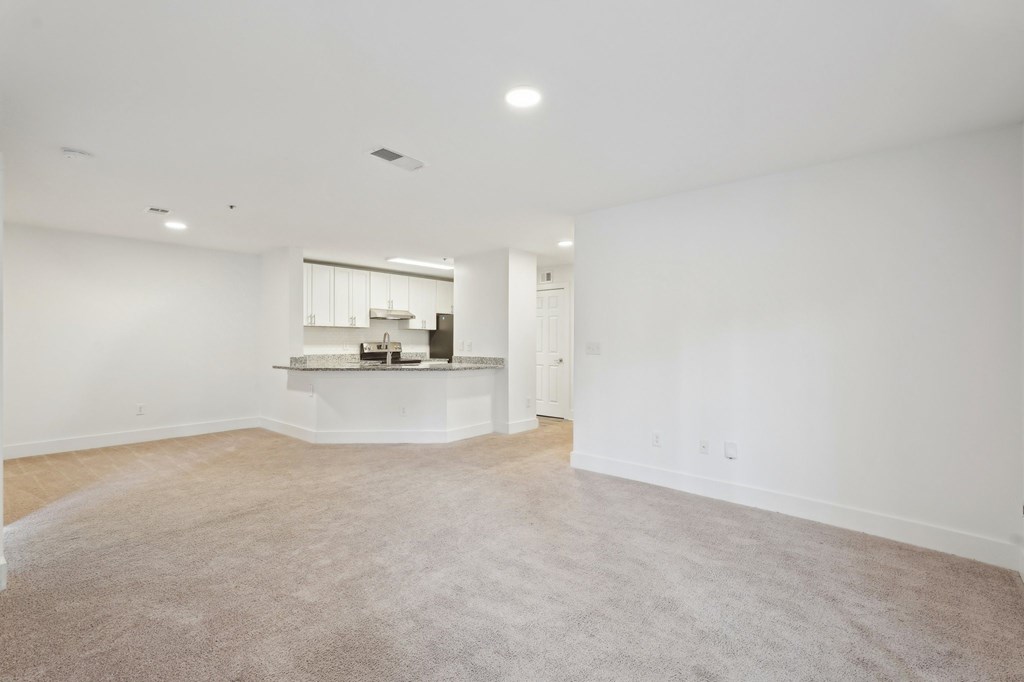 Living room with view of kitchen