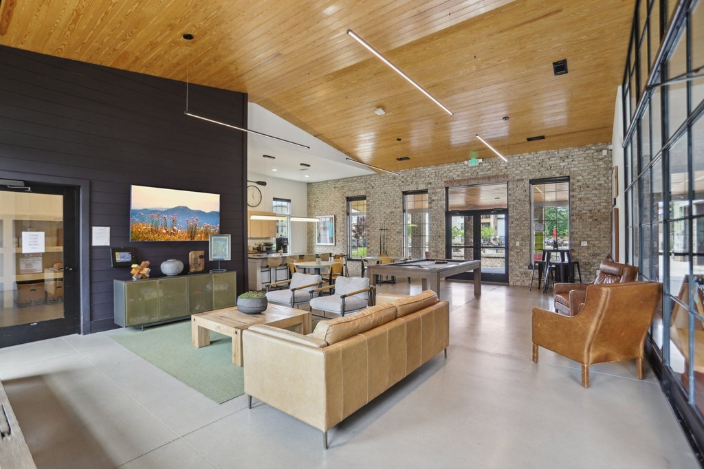 Resident Clubhouse with seating, billiards, and a tv