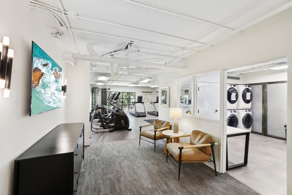 Fitness center with a laundry room and convenience store ..