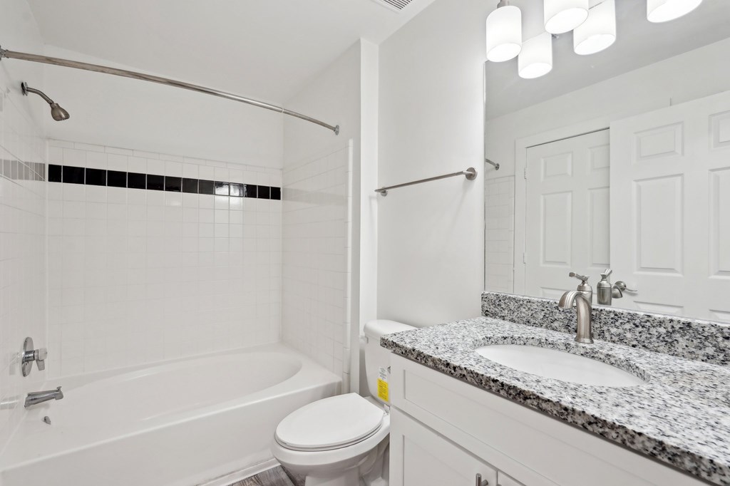 Bathroom with granite countertop