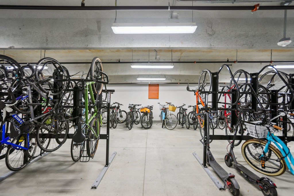 Covered  area with bike racks and scooter storage