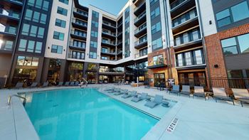 Resort Style Pool with Sun Deck & Grill Area