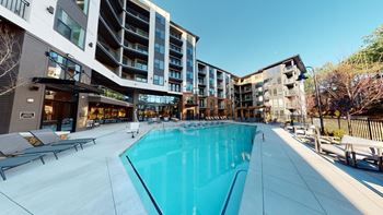 Resort Style Pool with Sun Deck & Grill Area