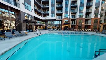 Resort Style Pool with Sun Deck & Grill Area