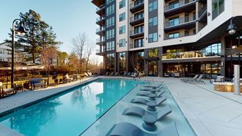 Resort Style Pool with Sun Deck & Grill Area
