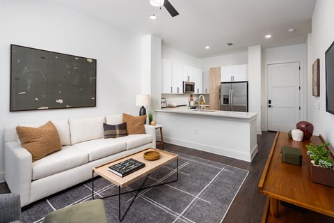 a living room with a couch and a coffee table