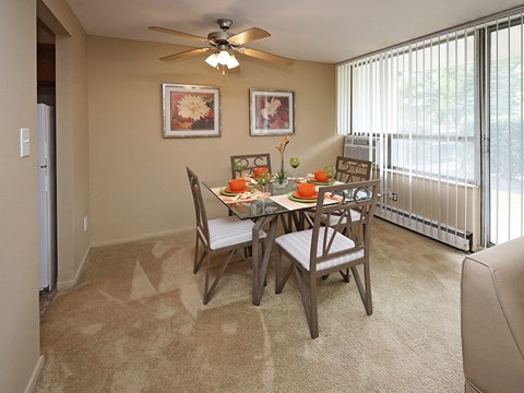 Dining room with table seating for four at Water's Edge Apartments, Ohio, 44123