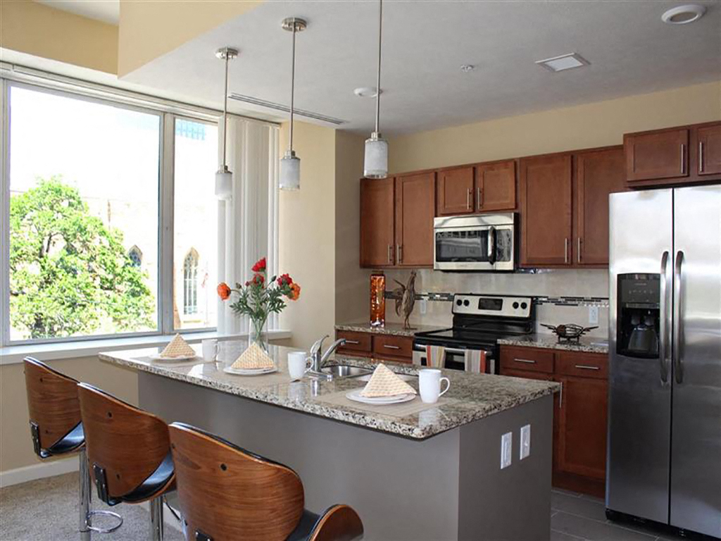 Eat-In Table With High Chairs In Clubhouse at Residences At 1717, Cleveland, Ohio