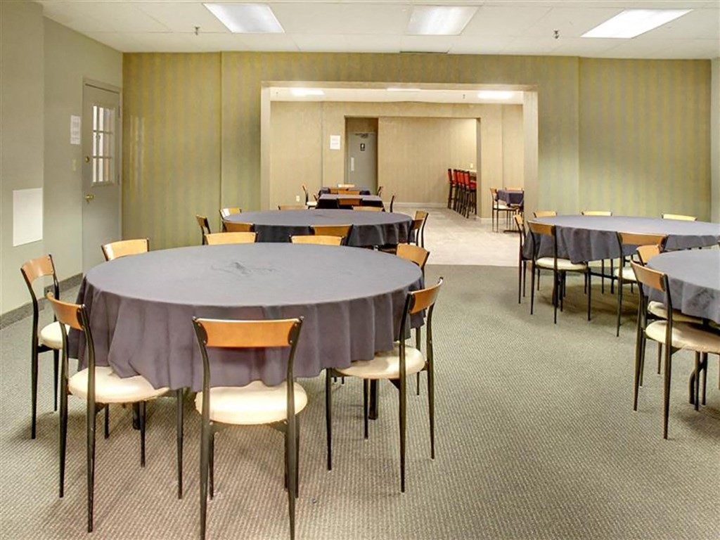 Community Room tables and chairs at Willoughby Hills Towers Apartments, Willoughby Hills, OH 44092