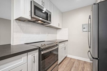 Kitchen With New Appliances Kitchen With New Appliances at Los Robles Apartments, Pasadena, CA - Photo Gallery 2