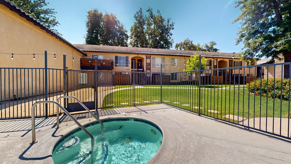our apartments have a private fenced in yard with a pool