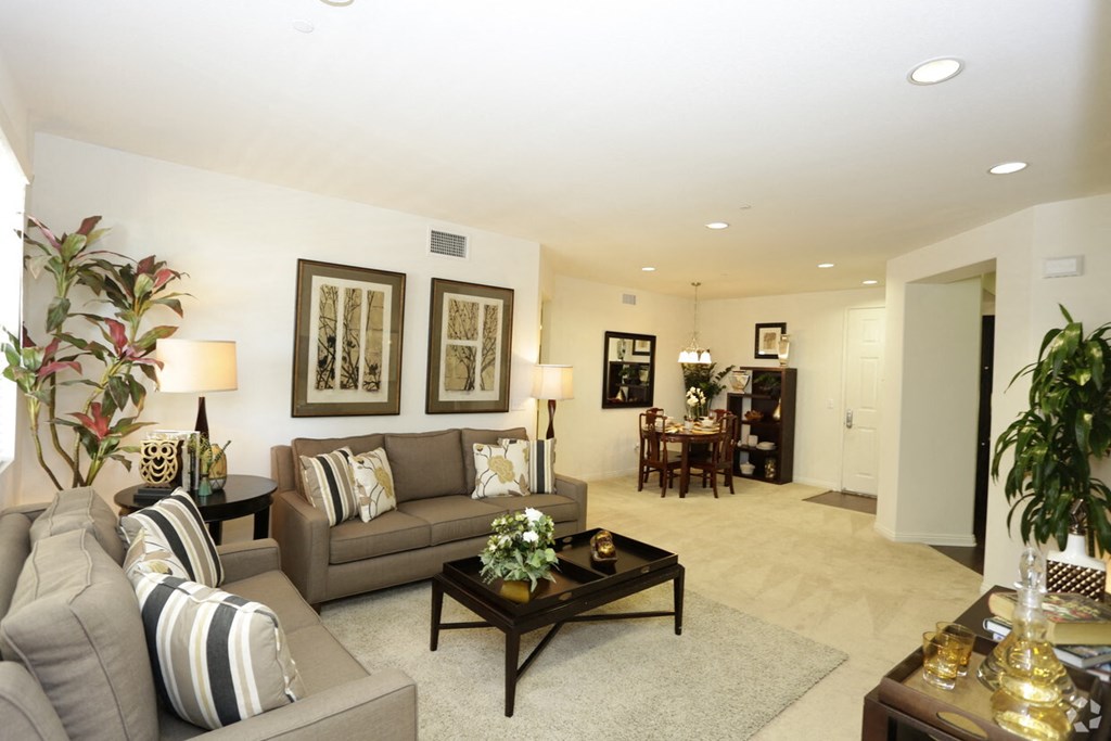 a living room with a couch and a table