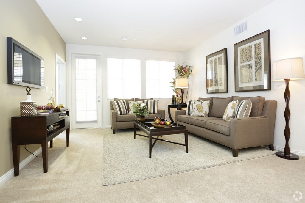 a living room with a couch and a table
